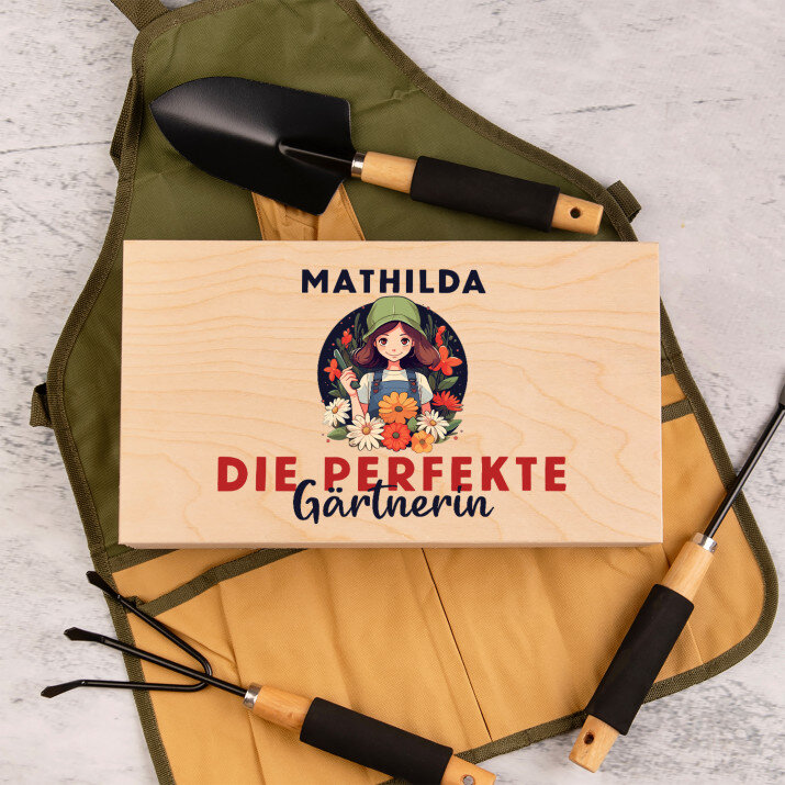 Perfekte gärtnerin - Gartengeräte in Schürze