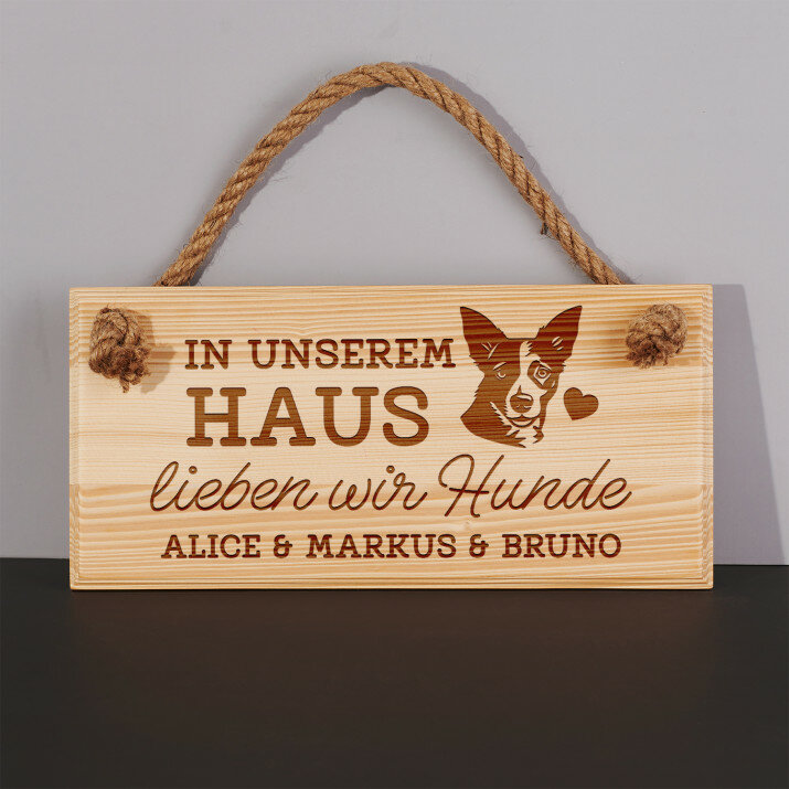 In unserem haus lieben wir hunde - Holzschild