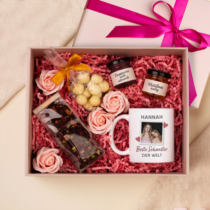 Set mit Tasse, Tee und Süßigkeiten Für die beste Schwester