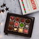 Frohe Weihnachten - Belgische Pralinen