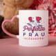 Set mit Tasse, Teddybär und Süßigkeiten Zum Frauentag